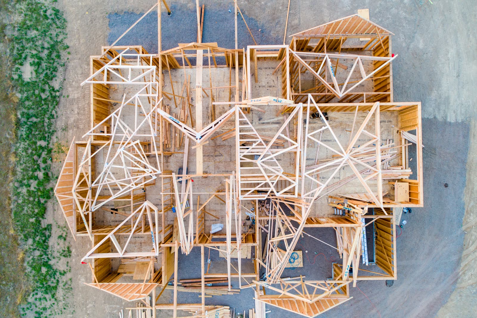 Overhead view of a custom home being framed