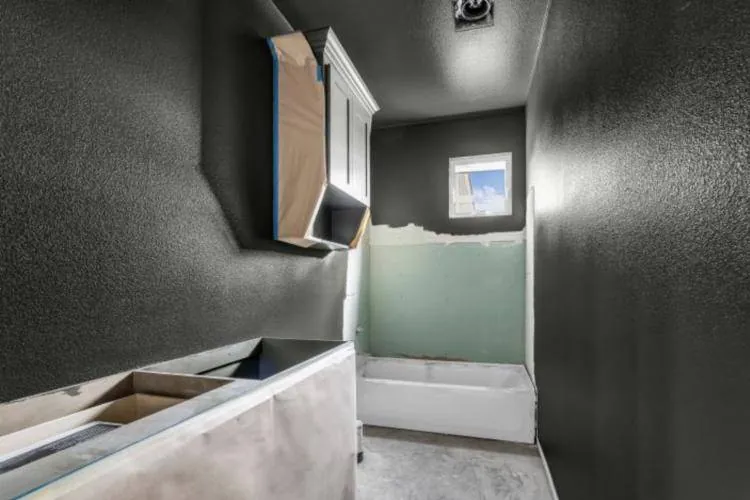 Guest bath with walls and ceiling in dark olive